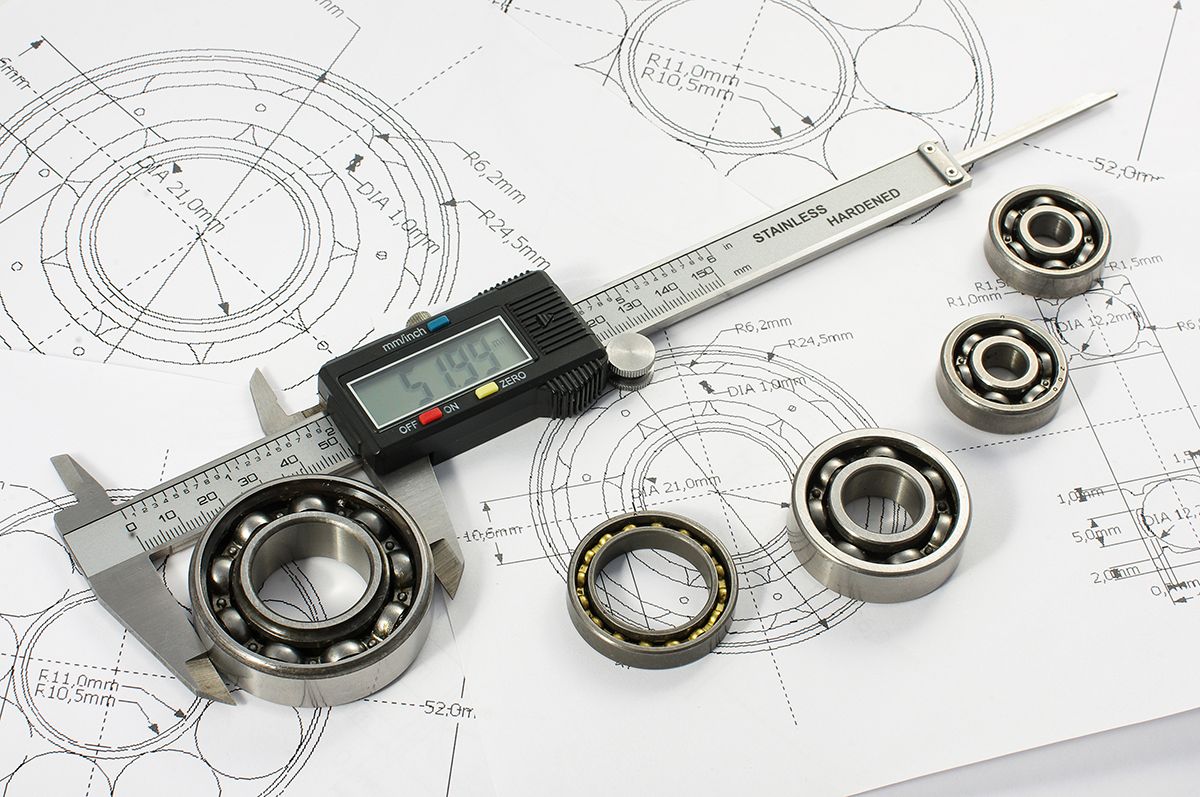 Calipers and bearings on a mechanical engineering drawing